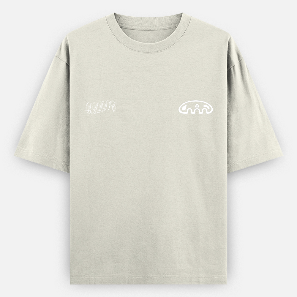 Beige t-shirt with white text and graphics on a light gray background